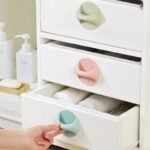 Drawer or door adhesive handle
